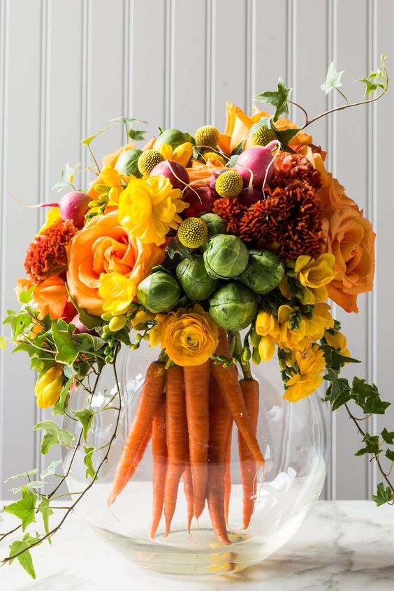 centrotavola pasquale originale fiori e carote