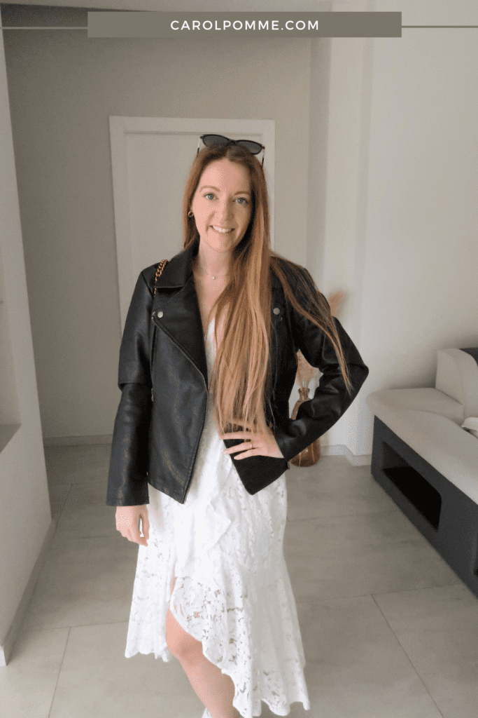 giacca di pelle su abito elegante